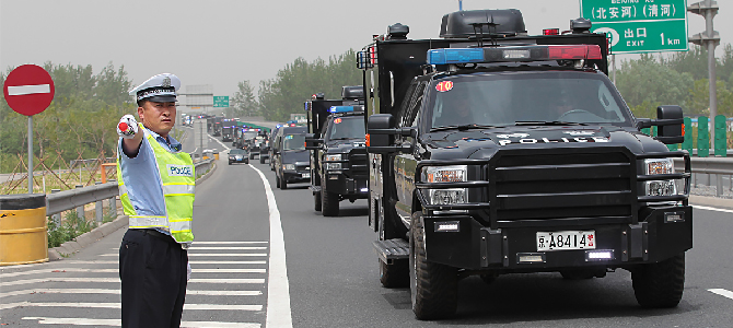 Chinese police drives trucks that officially shouldn't be in China